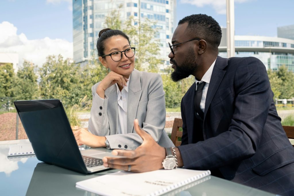 Two business partners discussing new strategies and ideas